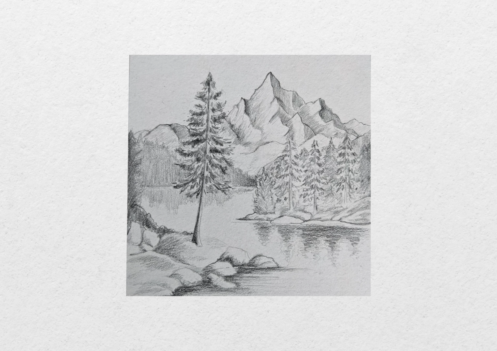 dessiner les détails d’un lac entouré de montagnes