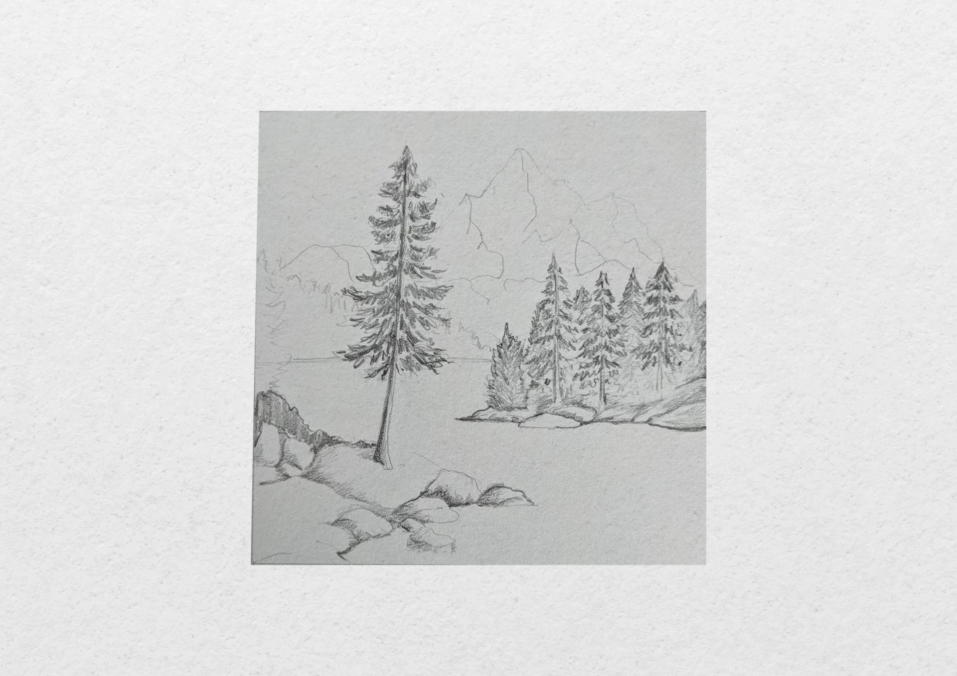 dessiner les ombres d’un lac entouré de montagnes