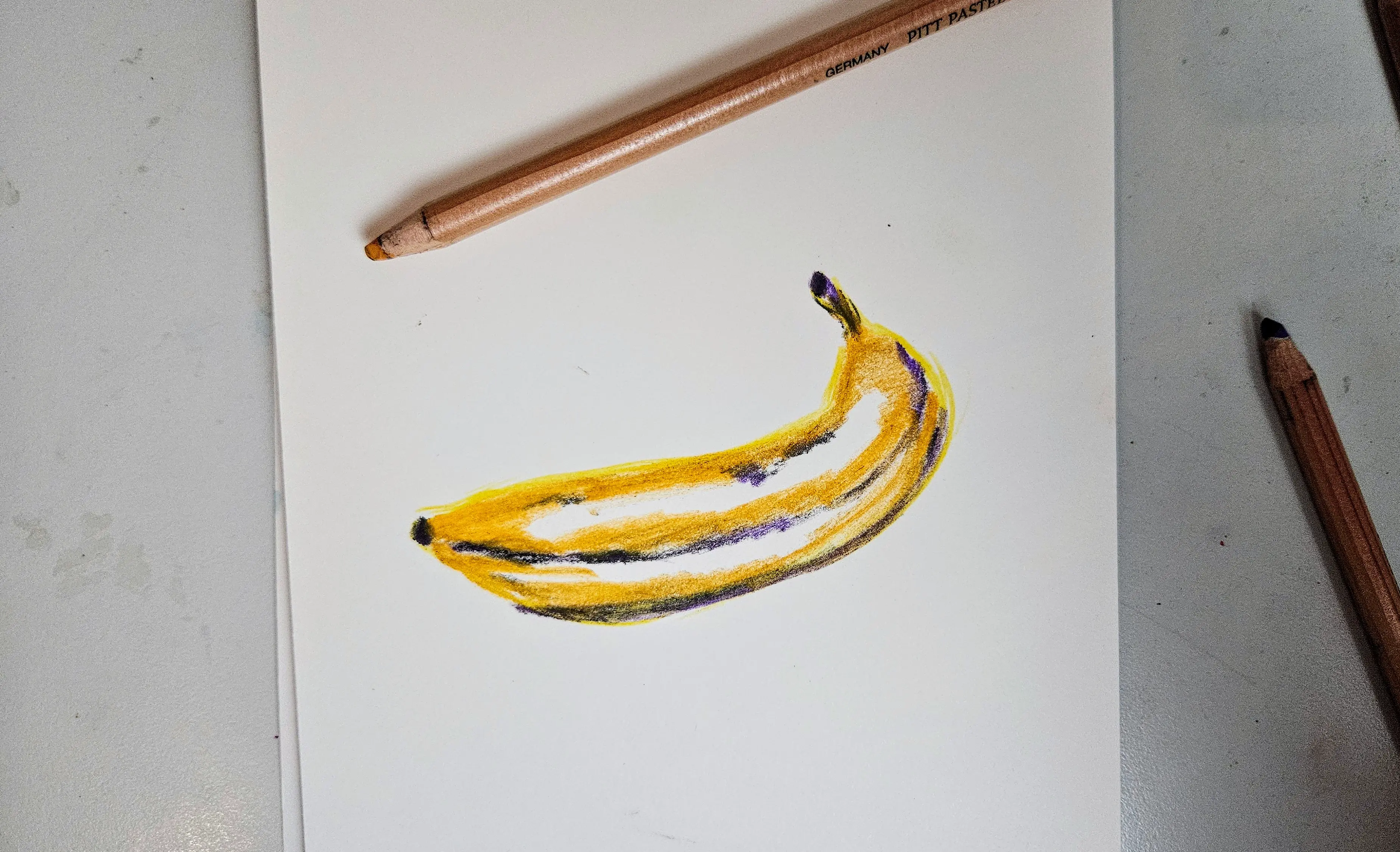 dessiner les contours d’une banane aux pastels