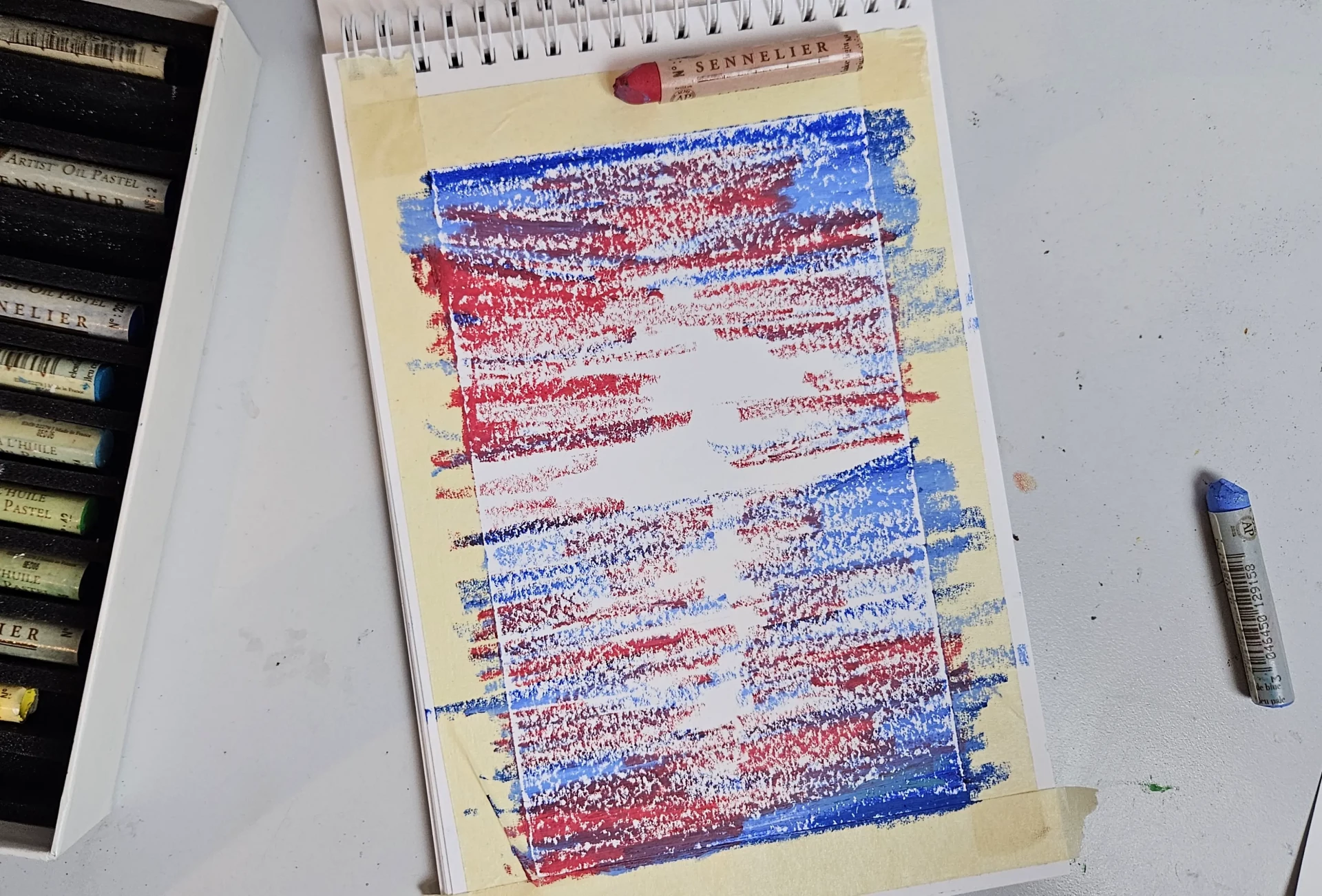 dessiner les couleurs chaudes d’un coucher de soleil aux pastels à l’huile