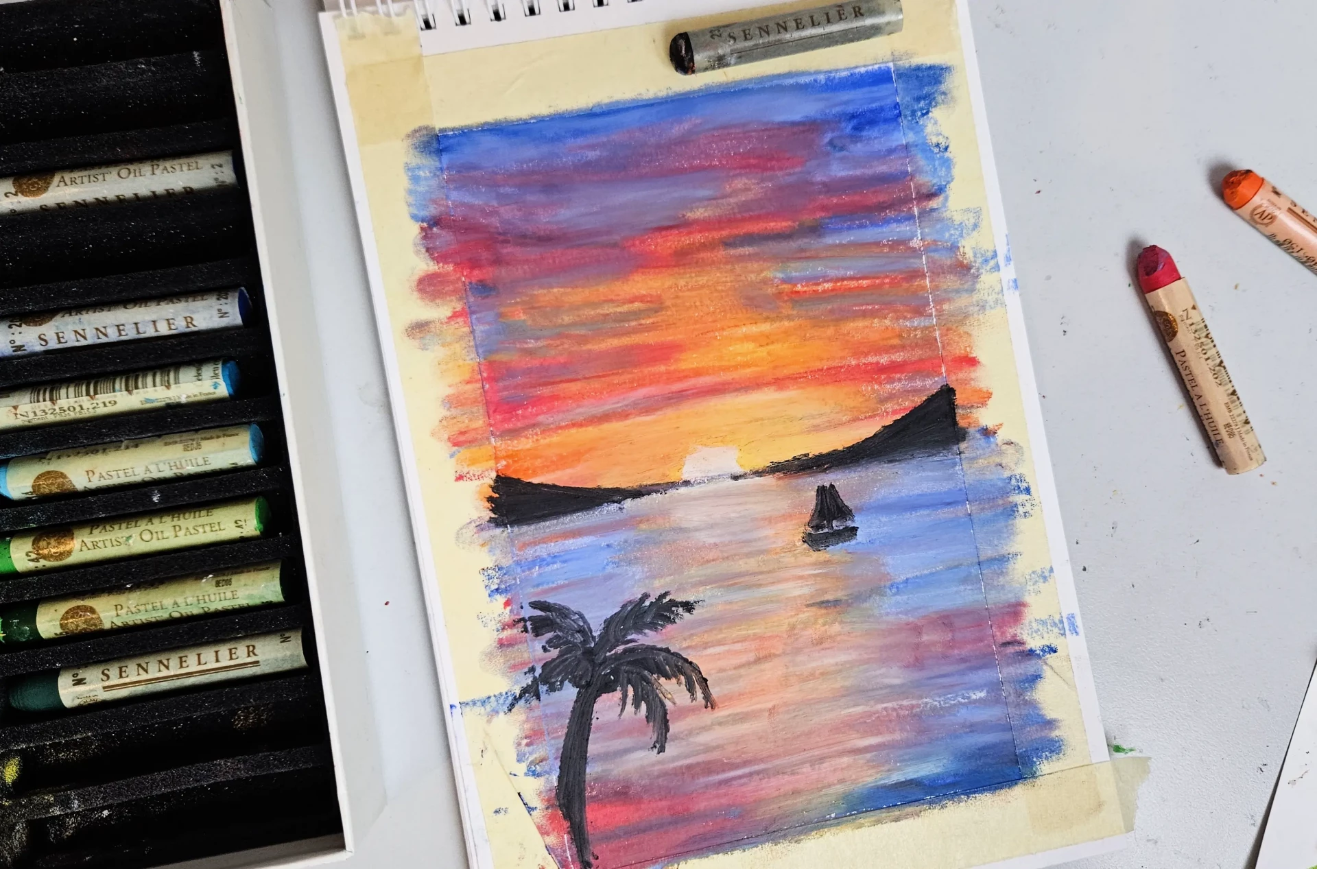 dessiner les décors d’un coucher de soleil avec des pastels à l’huile