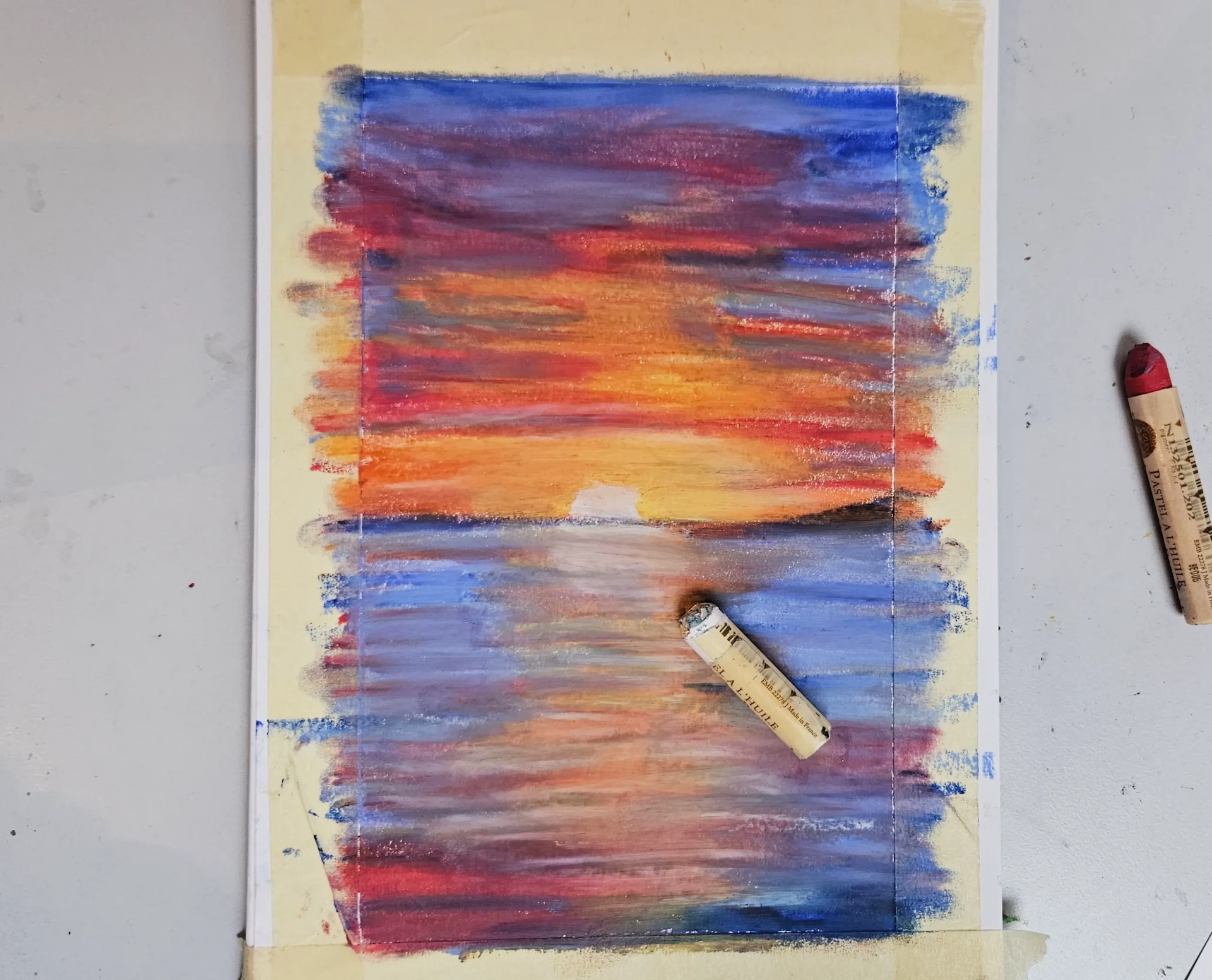 dessiner les reflets d’un coucher de soleil avec des pastels à l’huile